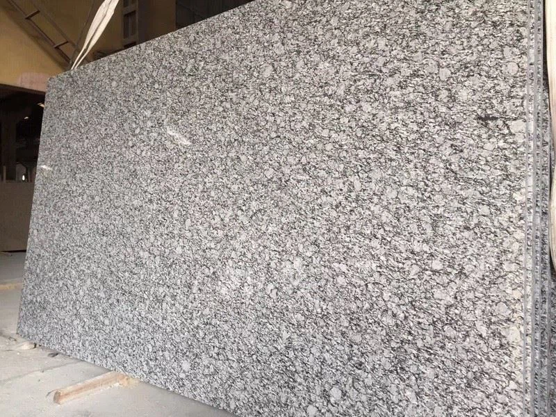 Spray White big slabs - flamed.jpg Spray White big slabs - flamed.jpg