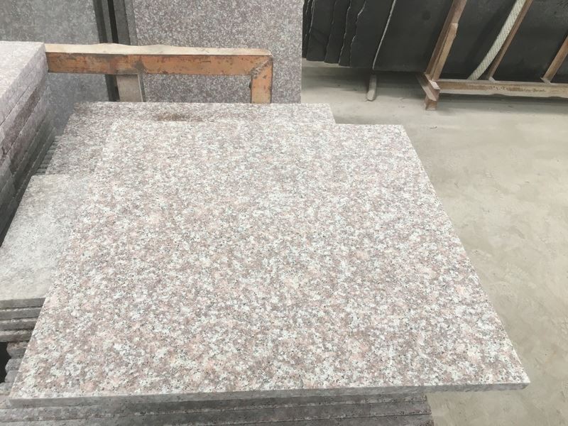 Flamed G687 Granite for outside paving.jpg